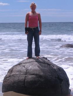 Jenel Bode on top of a Moeraki boulder