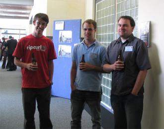 Jon Kitchen drinking with the monkeys Scott (left) and Humphrey (middle)